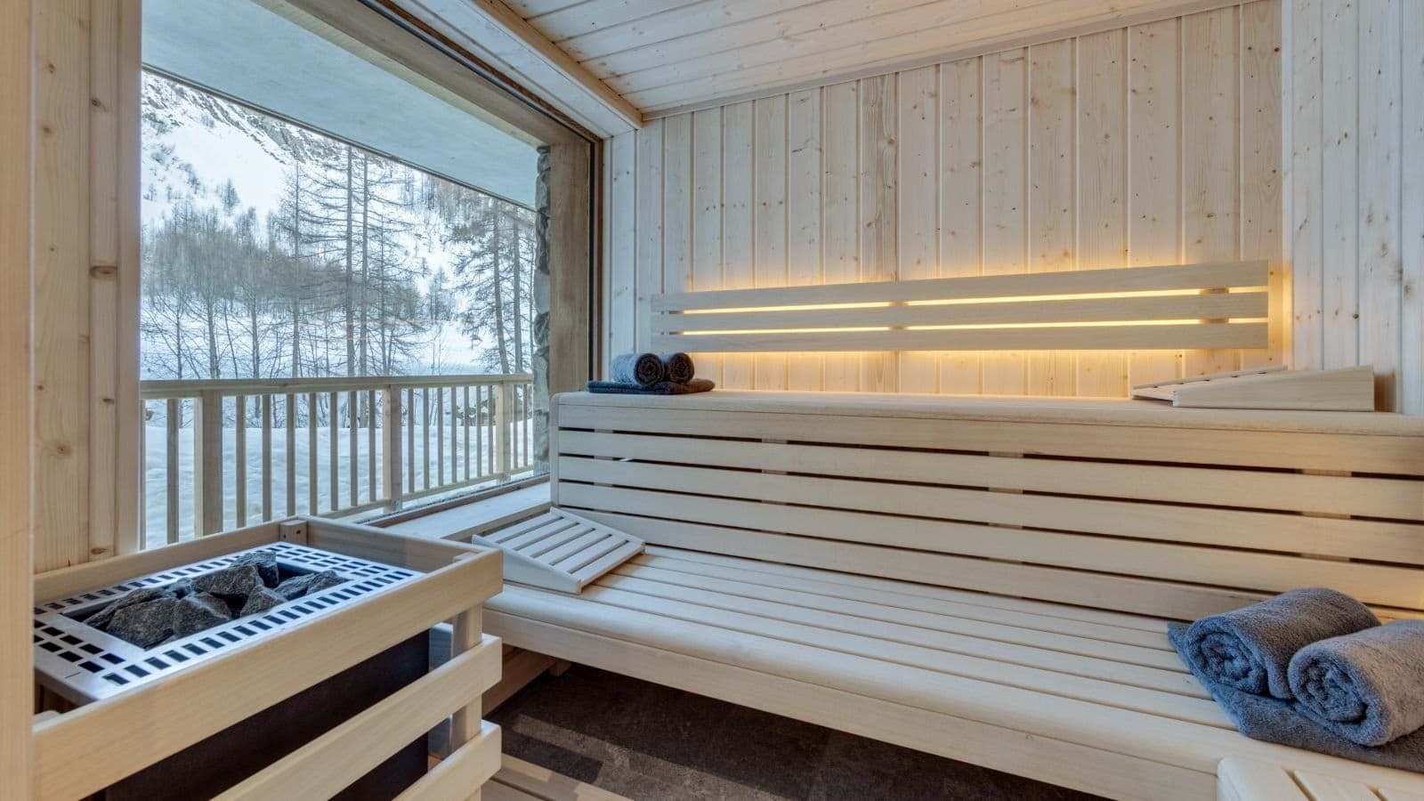 Private cedar sauna with panoramic alpine forest views