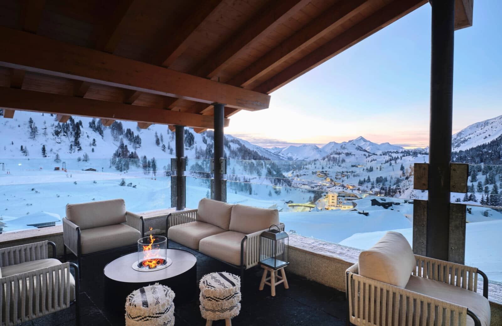 Covered terrace with gas fire pit and mountain valley views
