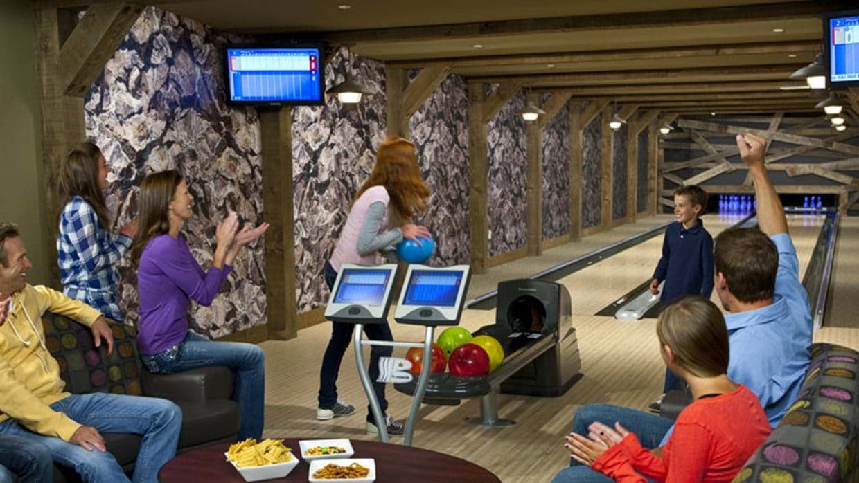 Private two-lane bowling alley with digital scoring and lounge seating