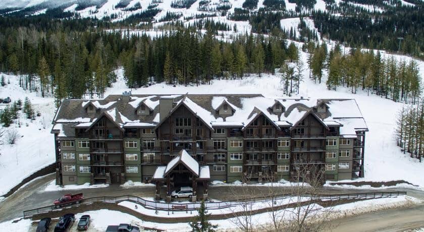 Ski-in/ski-out lodge exterior with direct access to mountain runs