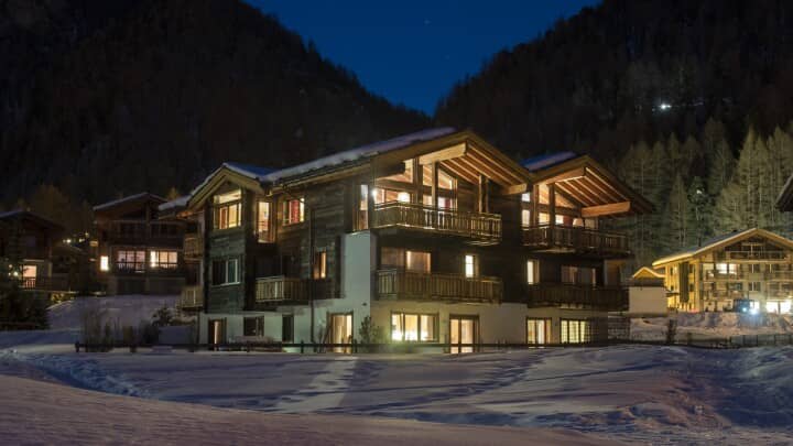 Ski-in/ski-out chalet with multiple private balconies and mountain views