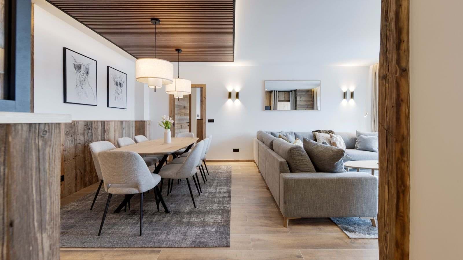 Open-plan living area with dining for 8 and large sectional sofa