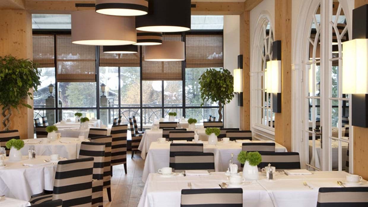 Dining room with terrace access and bamboo privacy shades