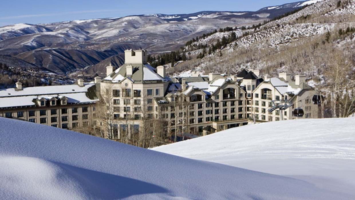 Ski-in/ski-out resort exterior with direct access to gondola and mountain trails