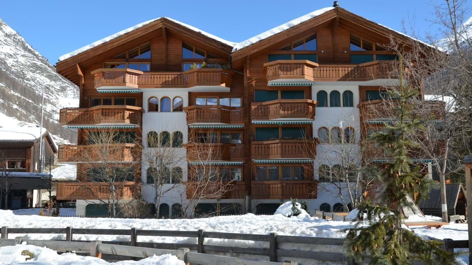 Alpine chalet with private balconies for each unit and mountain views