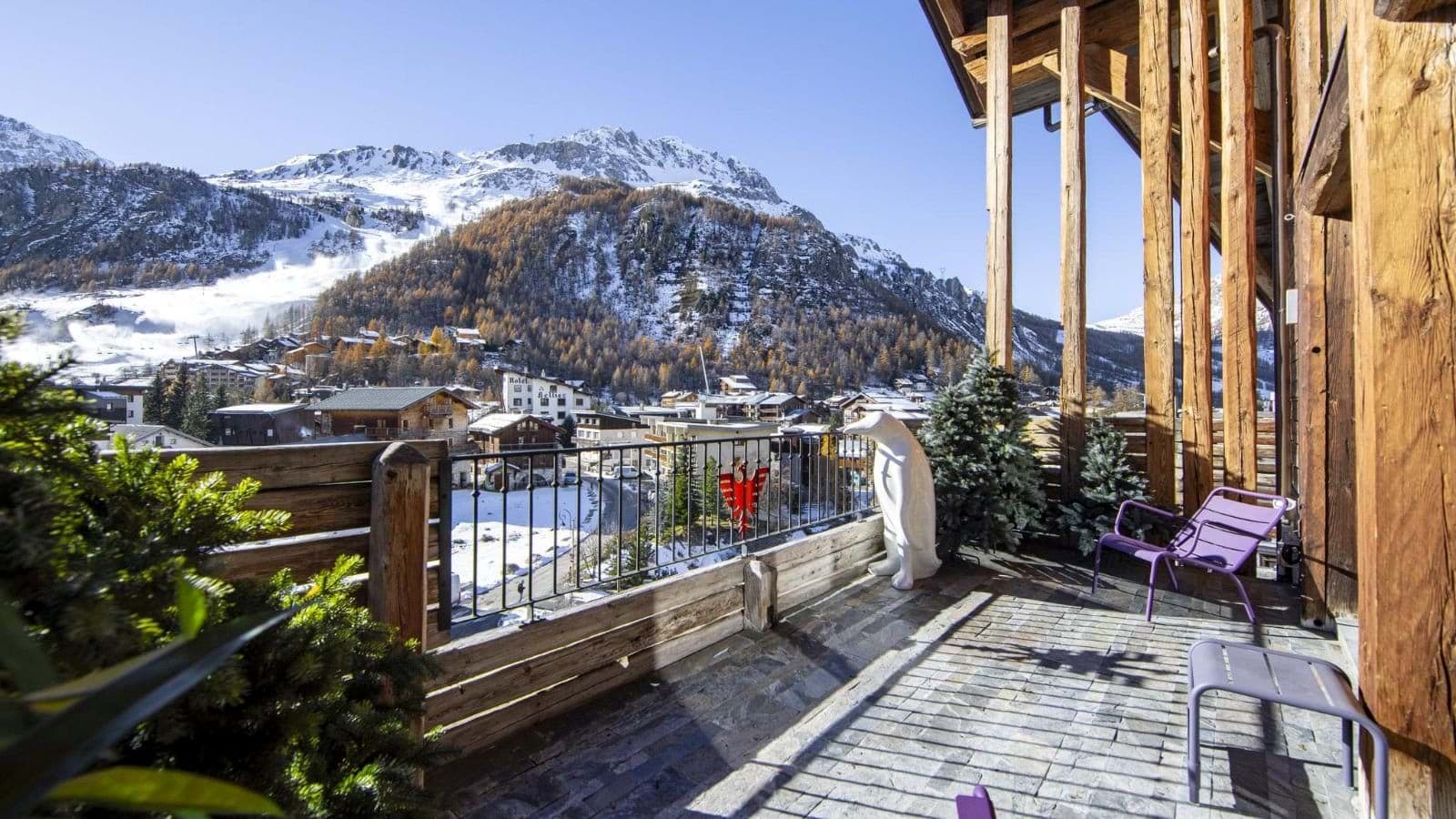 Private balcony with mountain views and Fermob metal seating