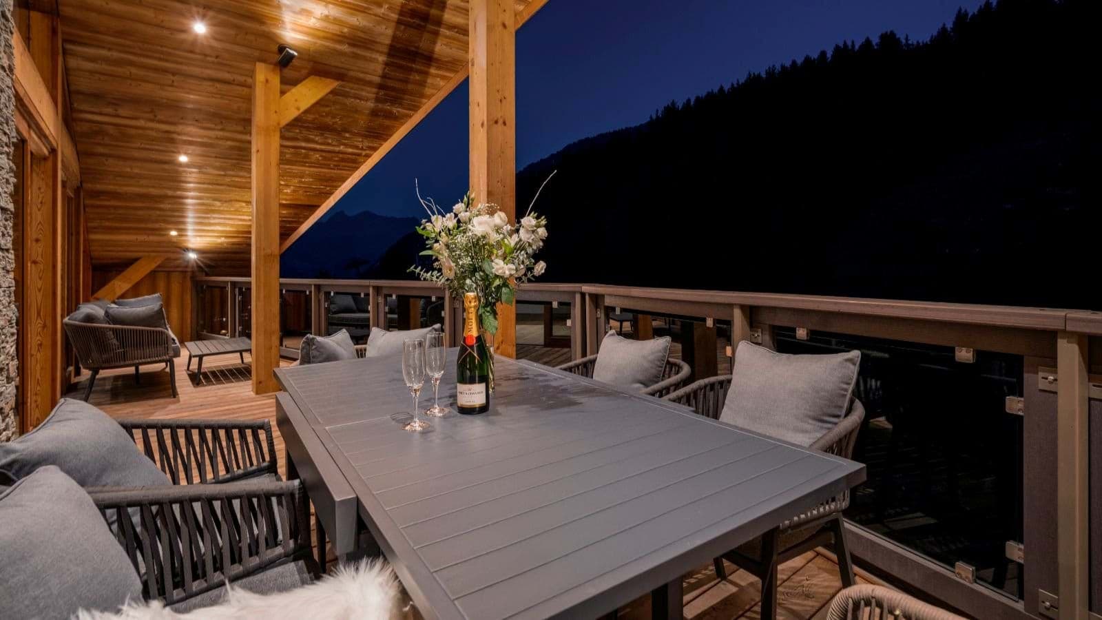 Covered terrace with dining for 8 and lounge seating area