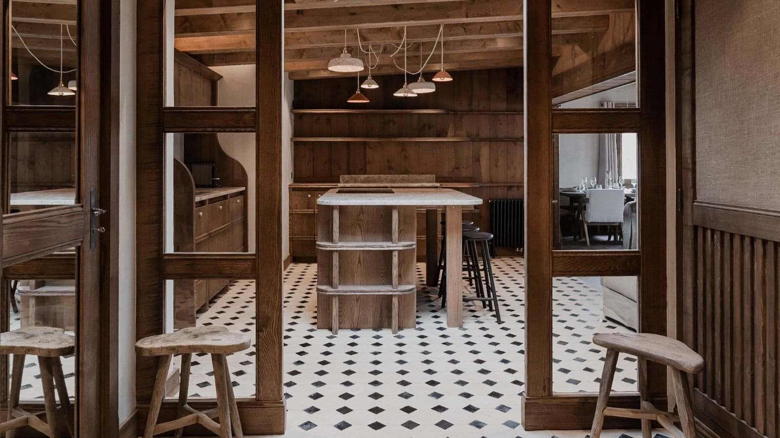 Kitchen island with bar seating and patterned tile floor