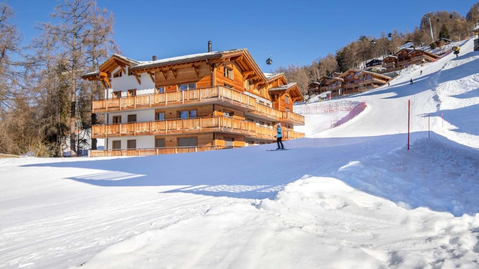 Chalet exterior with ski-in/ski-out access and wrap-around balconies
