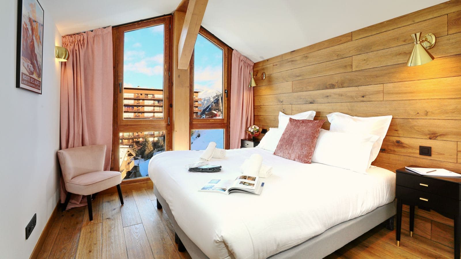 Primary bedroom with king bed and ski resort views