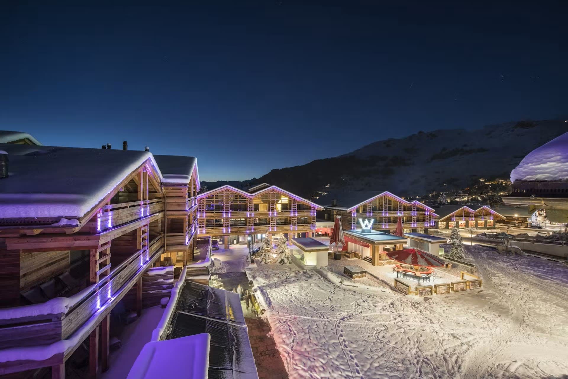 Ski-in/ski-out chalet village with private balconies and heated outdoor bar
