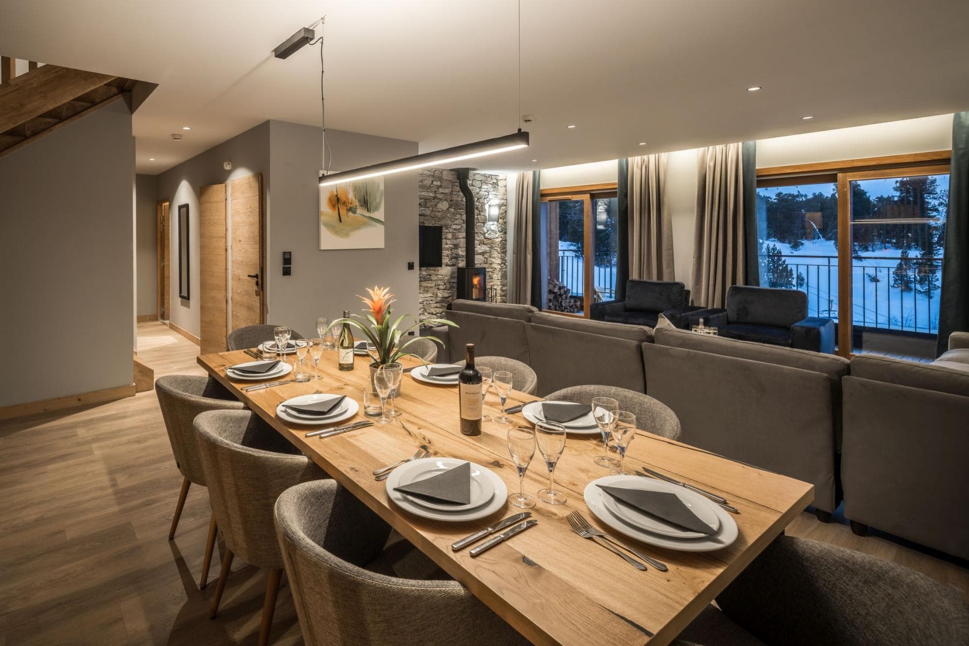 Dining area seats 10; wood-burning stove and balcony with snow views