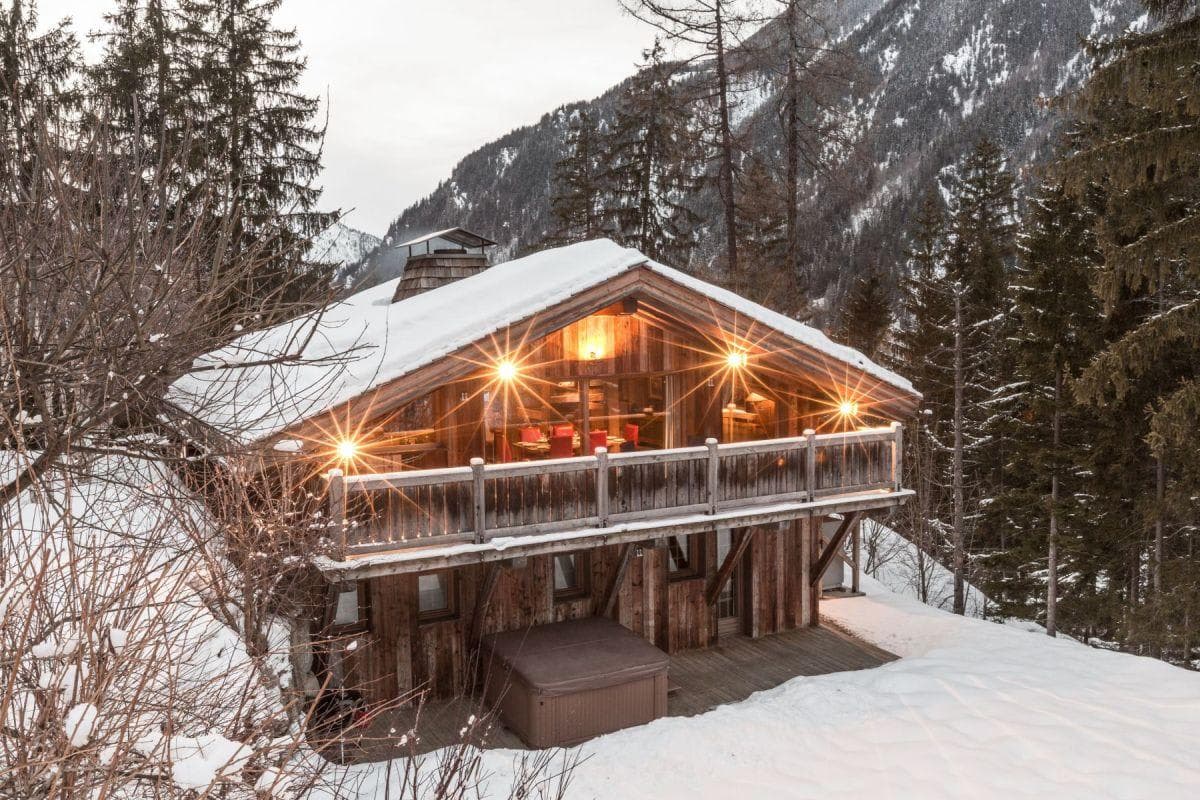 Ski-in chalet with private hot tub and forest-facing dining balcony