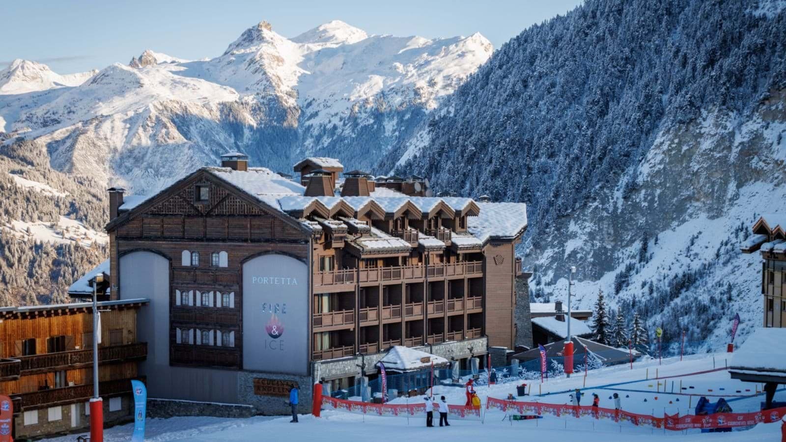 Ski-in/ski-out chalet exterior located directly on the slopes with mountain views