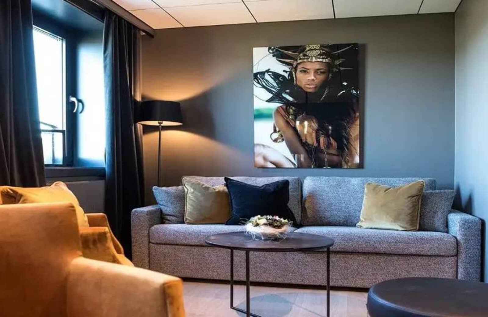 Living area with queen sleeper sofa and blackout curtains