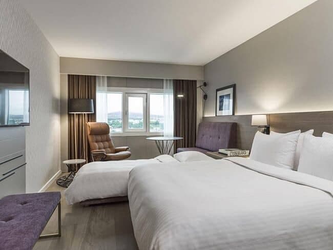 Guest bedroom with king bed, twin daybed, and reading nook