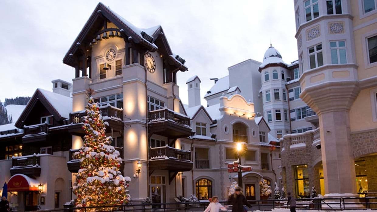 Ski village exterior with pedestrian plaza and seasonal clock tower