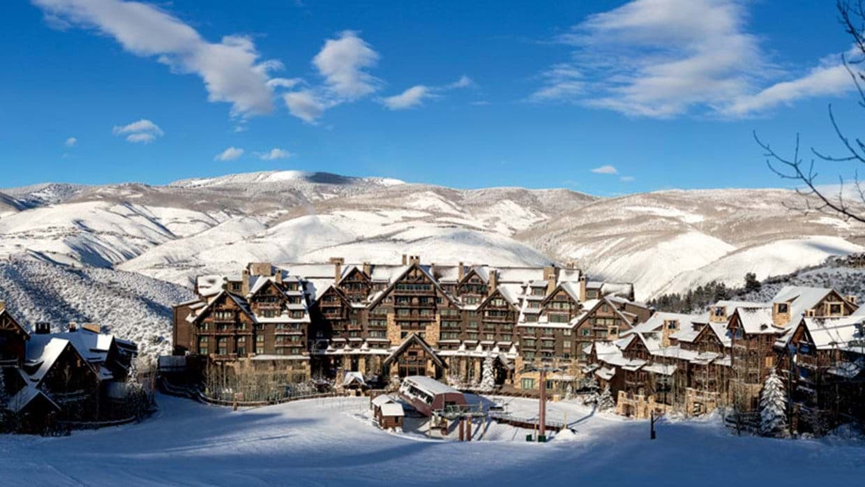 Ski-in/ski-out lodge exterior with direct access to lift and mountain trails