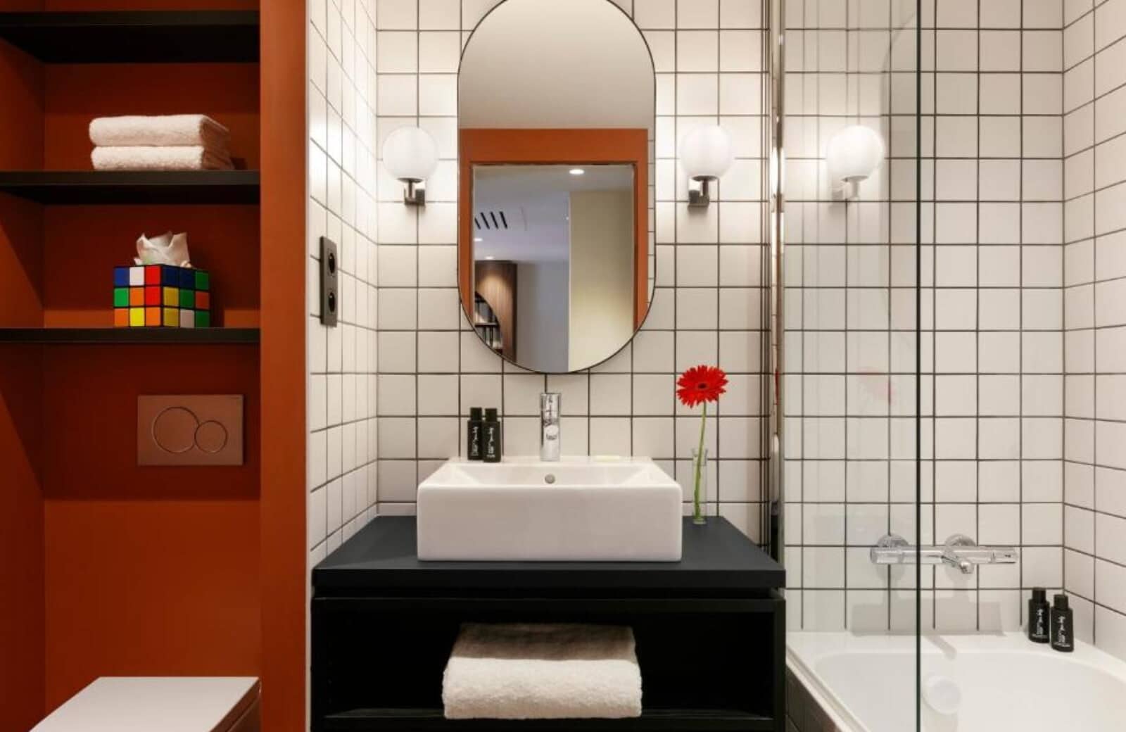Bathroom featuring vessel sink and walk-in glass shower