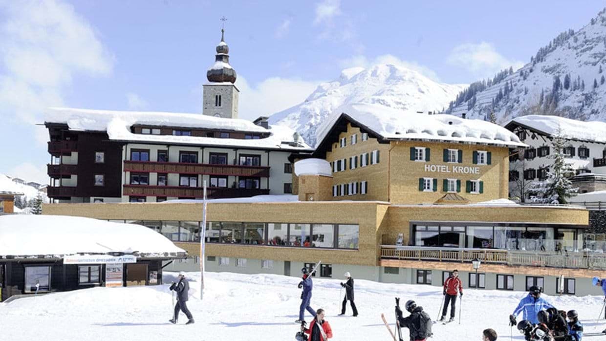 Ski-in/ski-out hotel exterior with direct access to slopes and mountain views