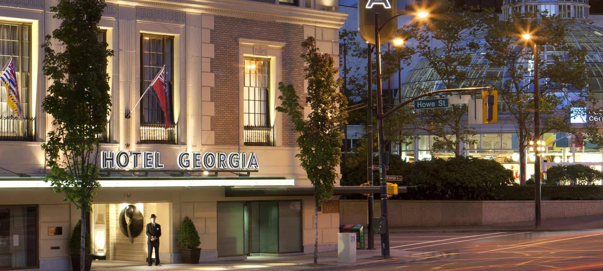 Hotel Georgia entrance with doorman and historic facade architecture