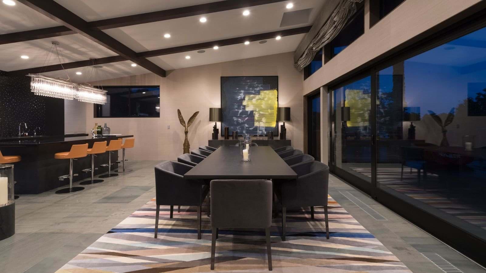 Dining table seats 10 with additional breakfast bar seating for 4