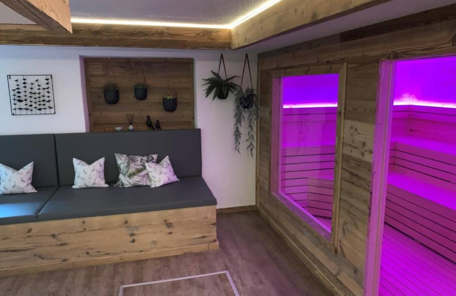 Spa area with bench seating and private wood-paneled sauna