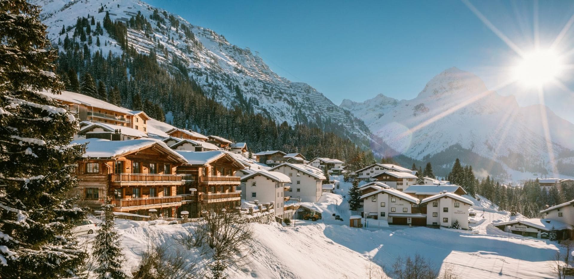 Ski-in/ski-out chalet with south-facing balconies and alpine mountain views