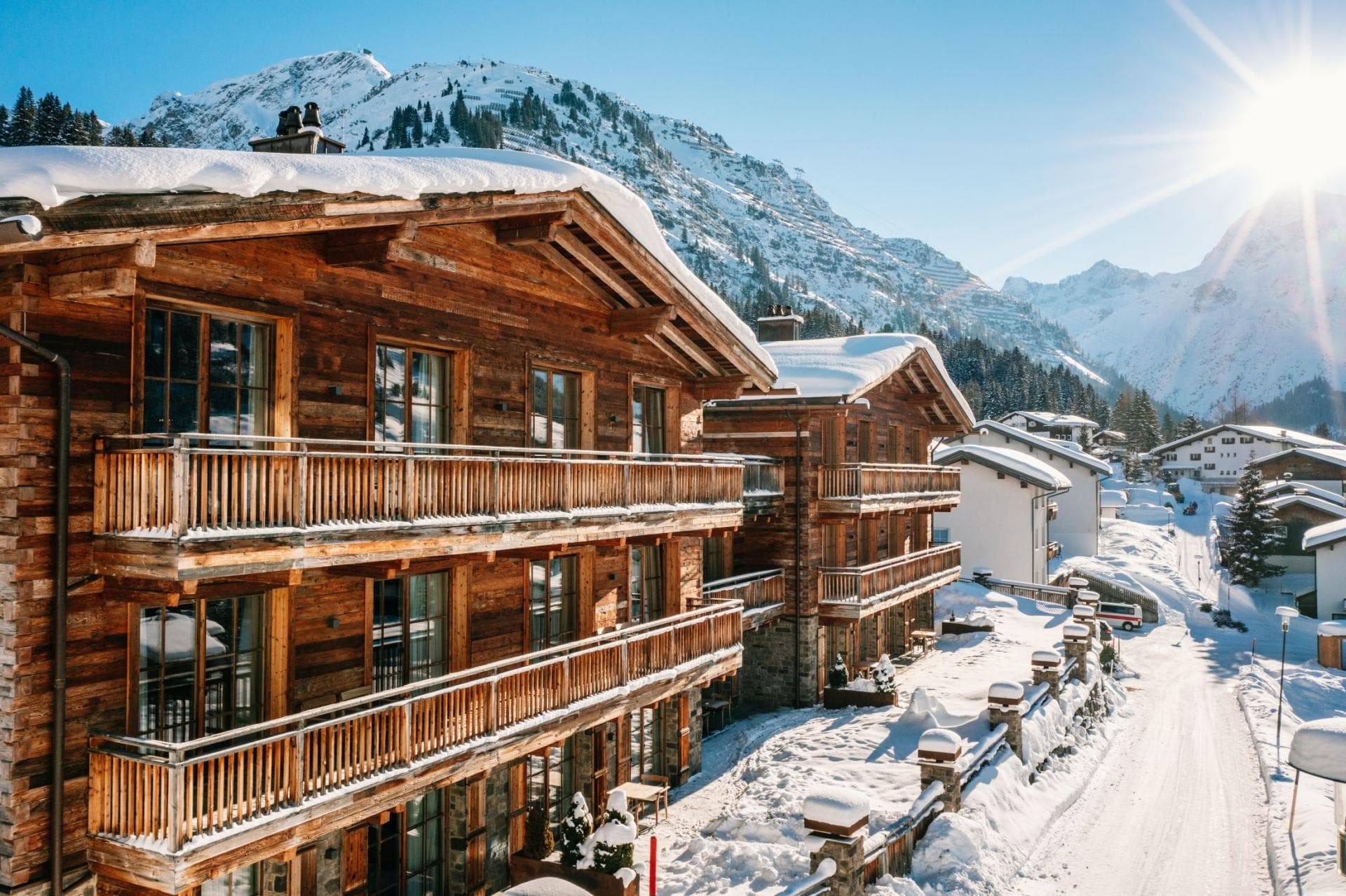 Ski-in/ski-out chalet exterior with private balconies and mountain views