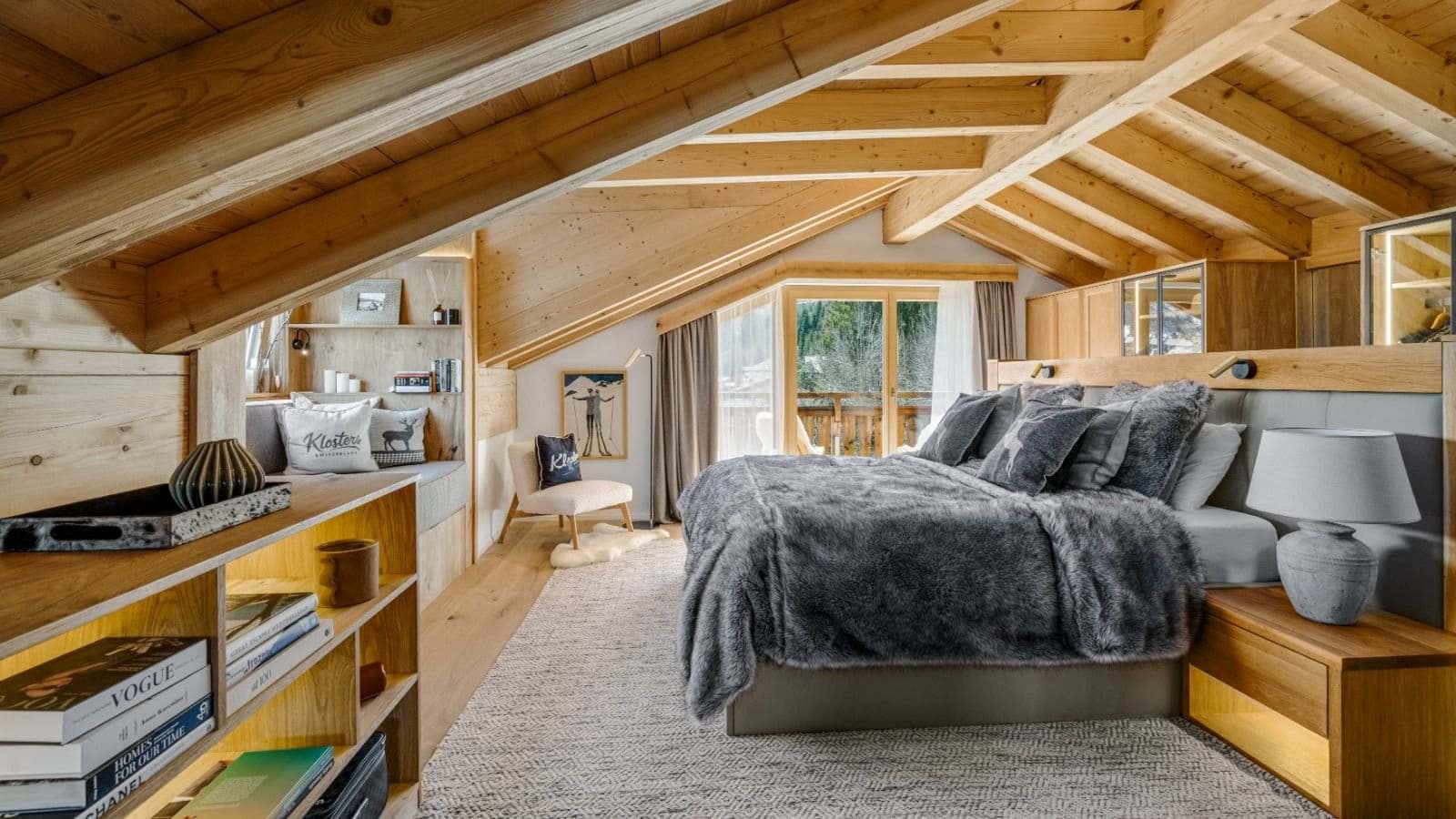 Loft bedroom with king bed and private balcony access