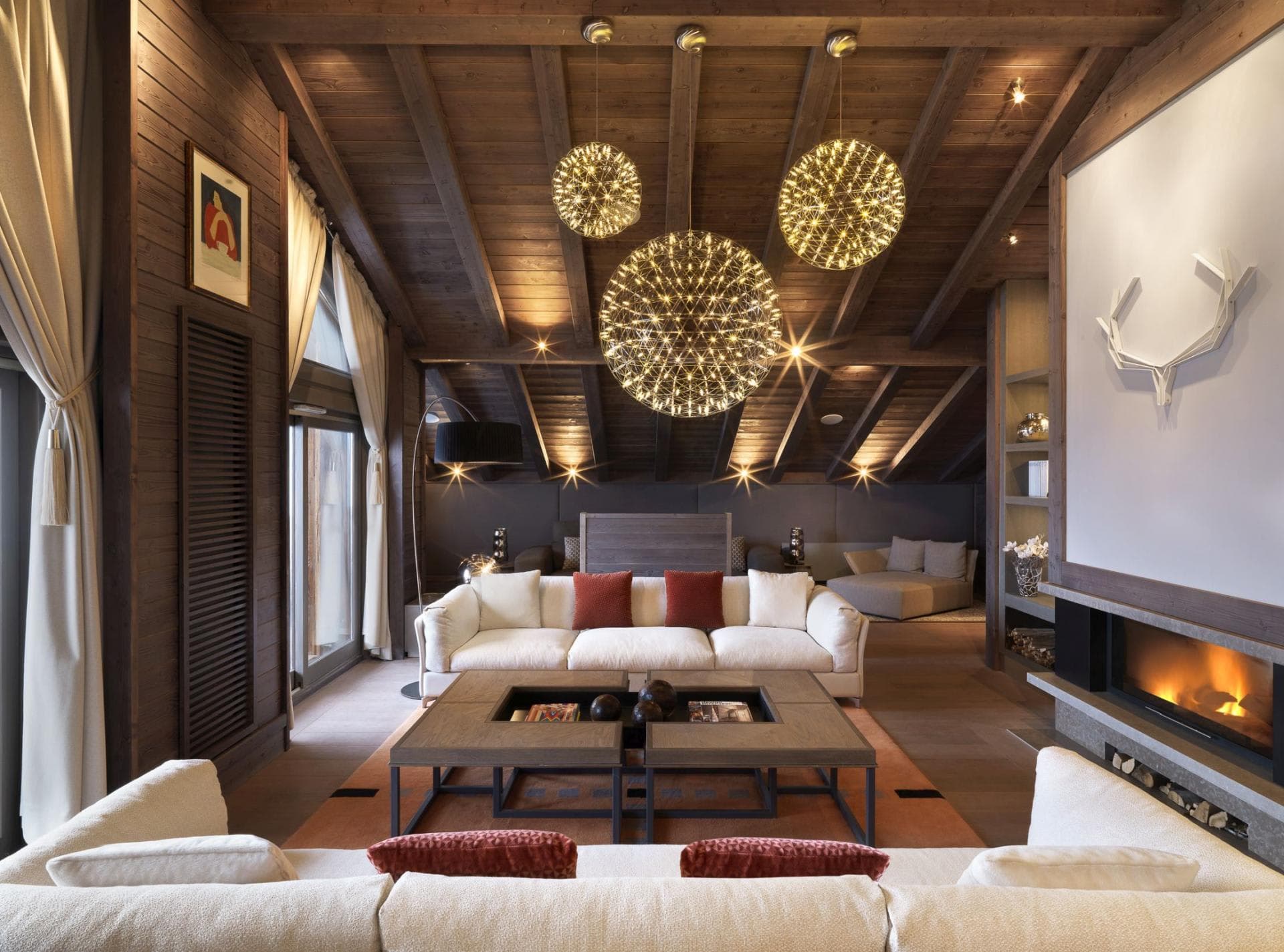 Living area with vaulted wood ceiling and built-in fireplace