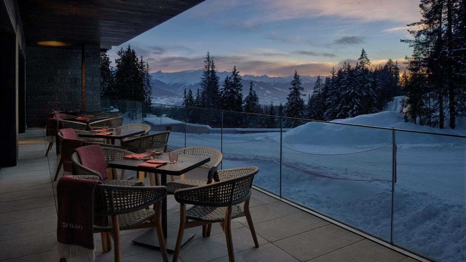 Outdoor terrace with mountain views and blankets provided for dining