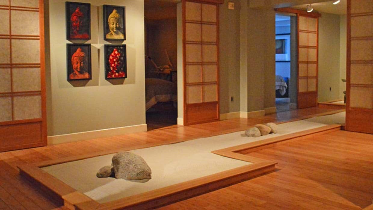 Indoor Zen garden with sand and stone; sliding shoji doors