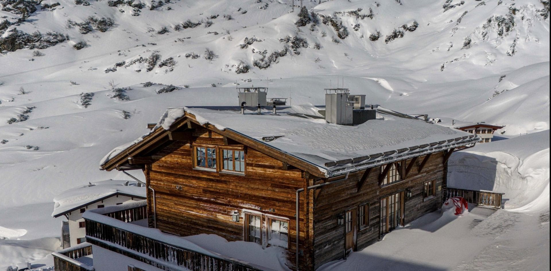 Ski-in, ski-out timber chalet with direct access to alpine slopes