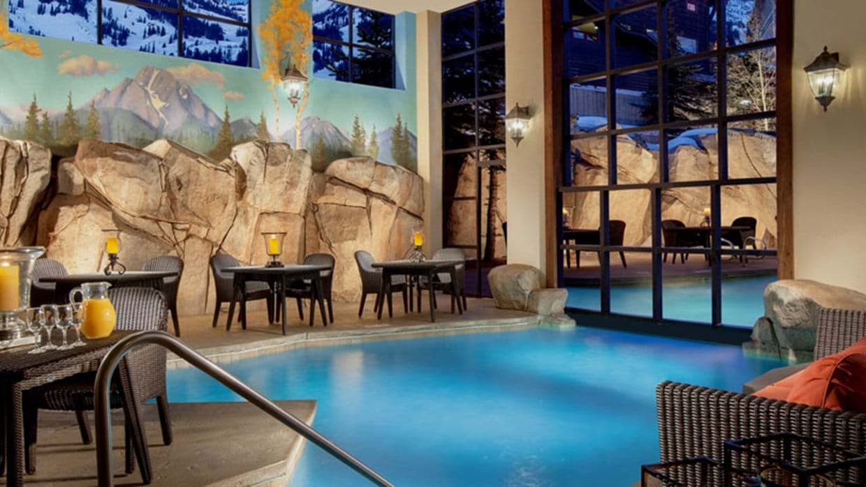 Indoor pool with swim-through access to heated outdoor section