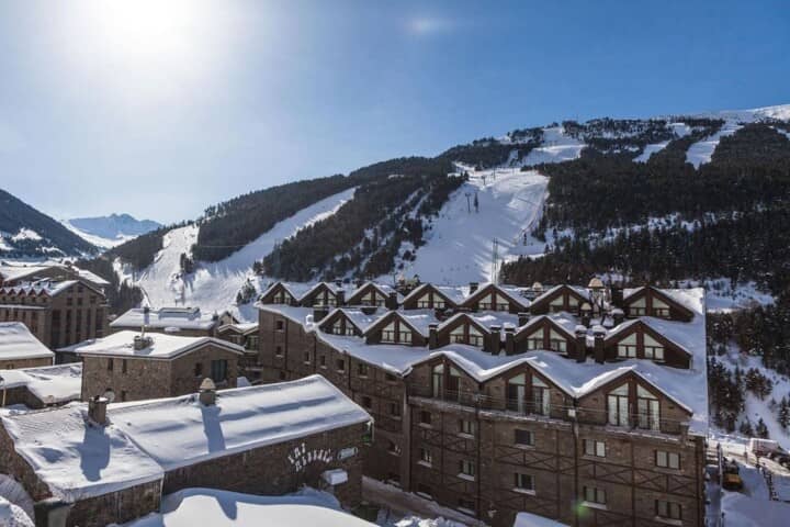 Mountain view overlooking ski slopes with direct trail access