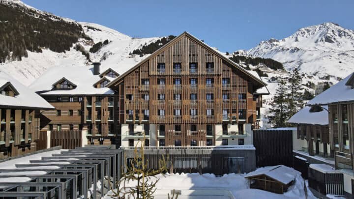 Ski-in, ski-out timber chalet with private balconies and mountain views
