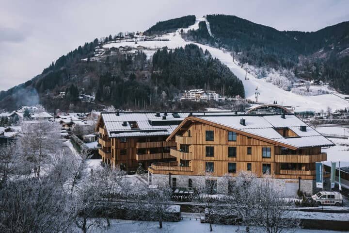 Chalet exterior with mountain views and direct proximity to ski lifts