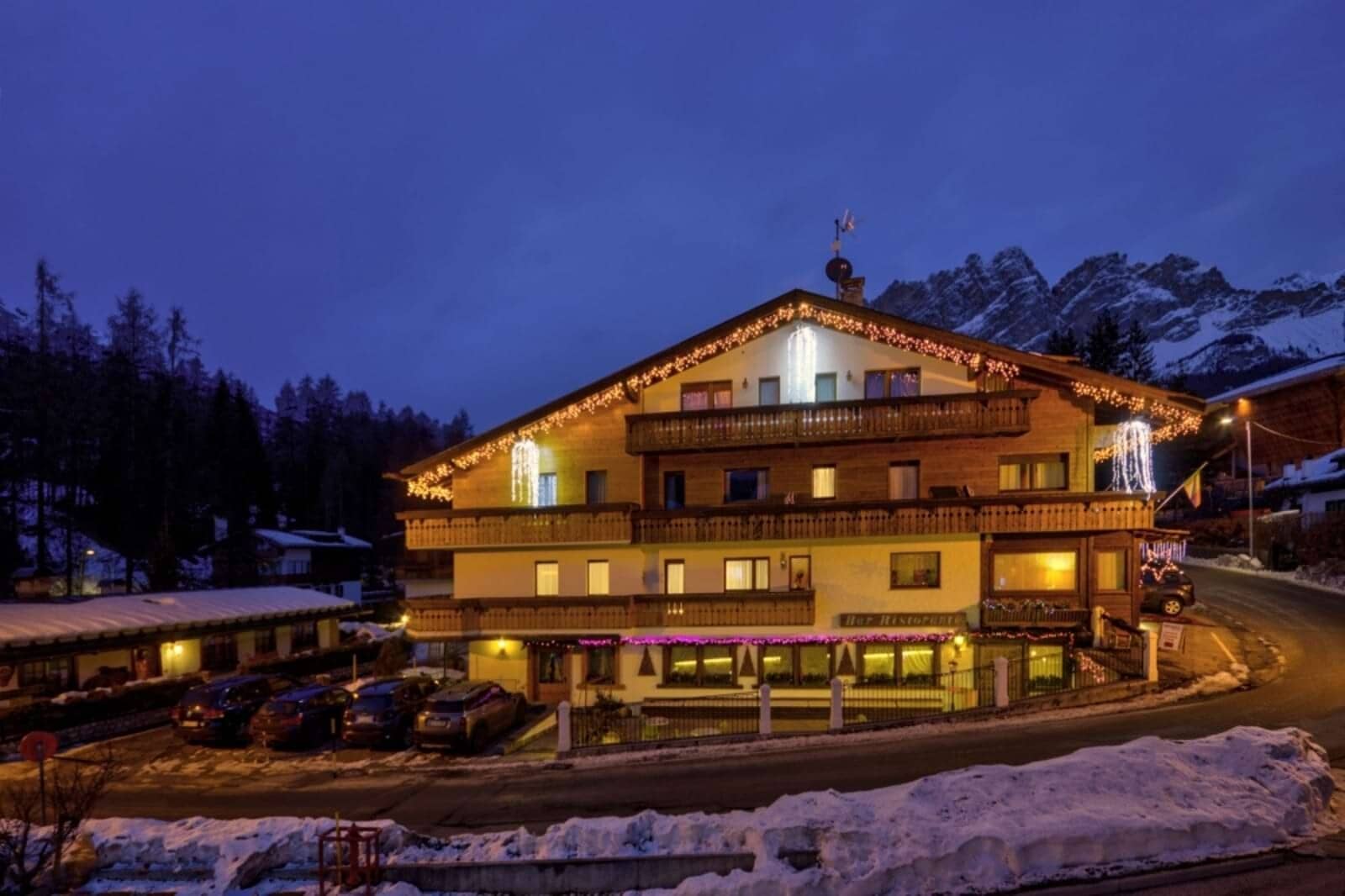 Chalet exterior with mountain views and onsite guest parking
