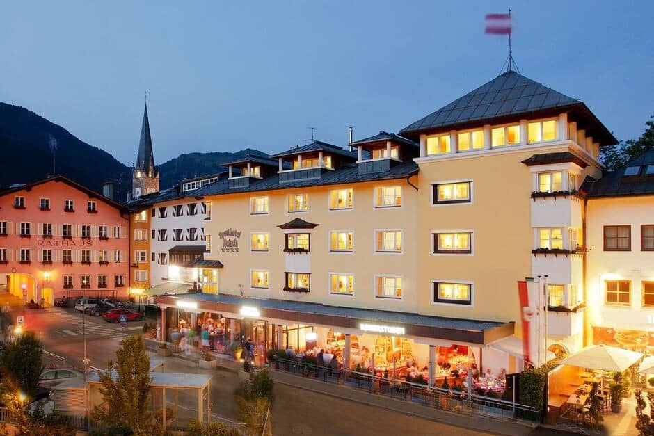 Property exterior in pedestrian zone with ground-floor dining and mountain views