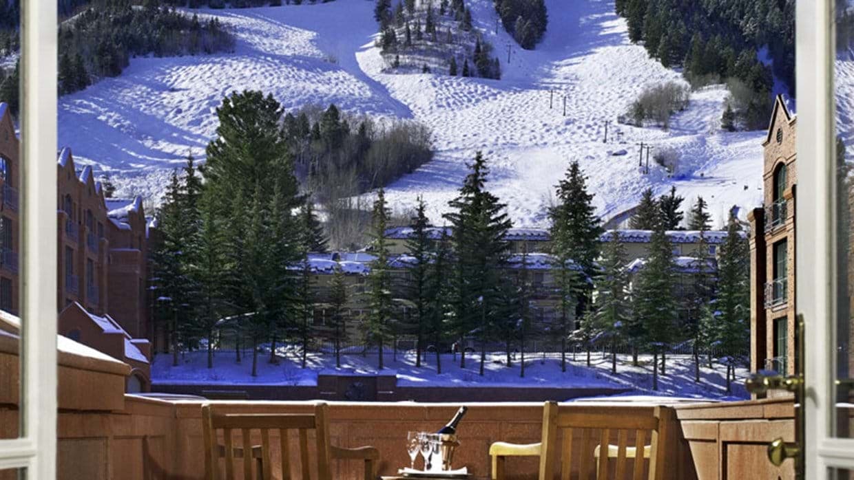 Private balcony with seating and direct views of groomed ski runs