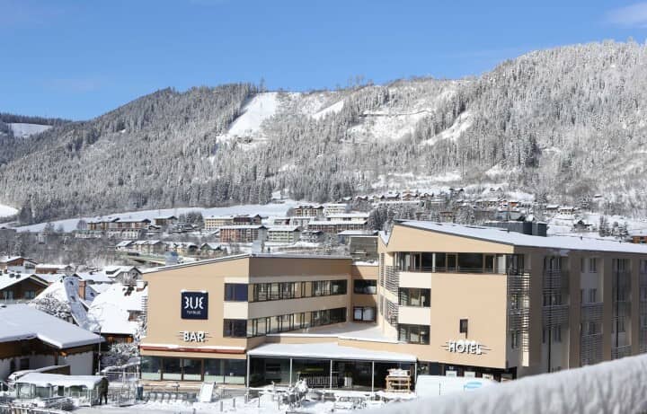 Hotel exterior with on-site bar and walking distance to ski slopes