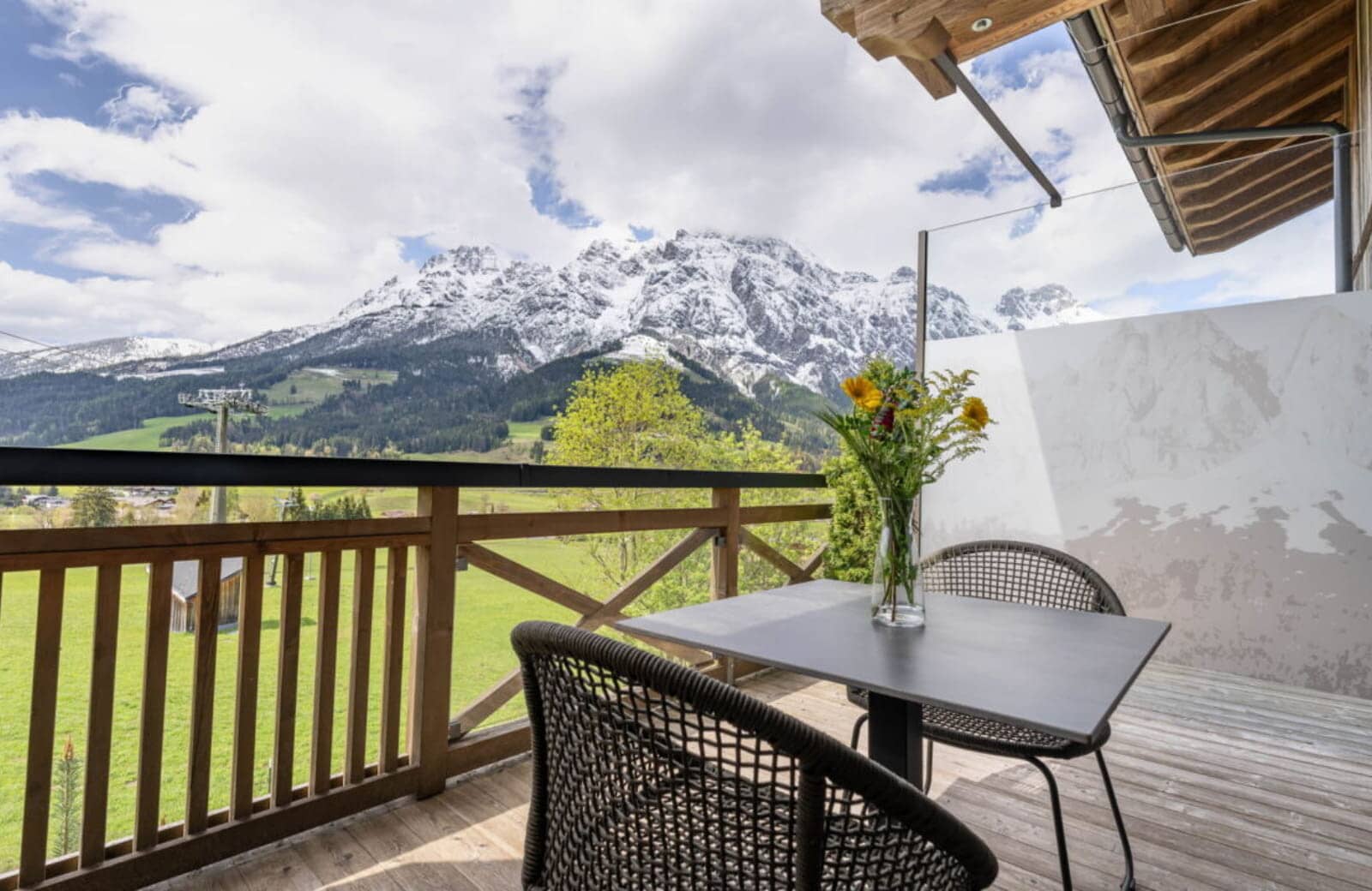 Private balcony with mountain views and outdoor dining for two