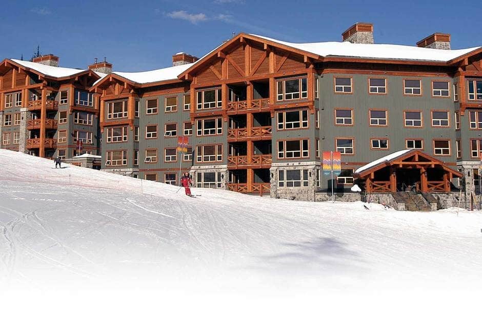 Ski-in, ski-out lodge exterior located directly on the mountain slope