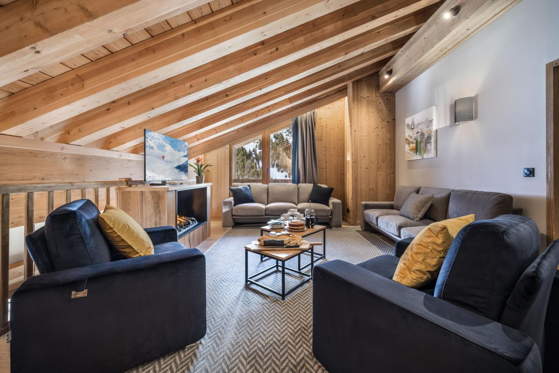 Mezzanine living area with electric fireplace and seating for 8