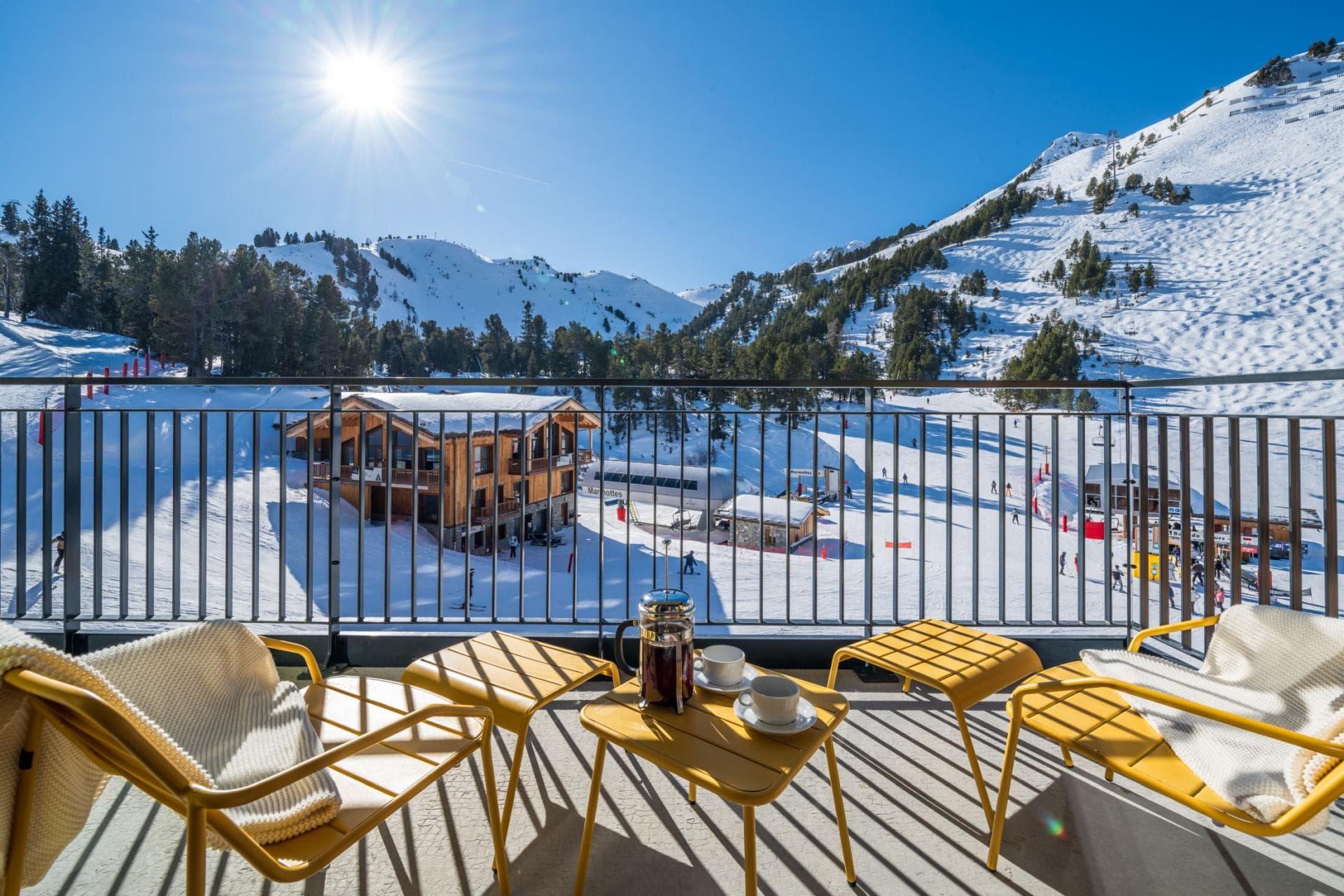 Private balcony with ski-in/ski-out views and proximity to chairlifts