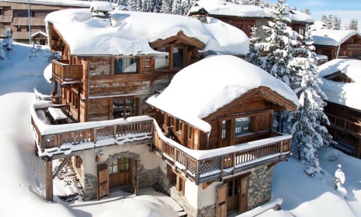 Ski-in, ski-out timber chalet with multiple private balconies
