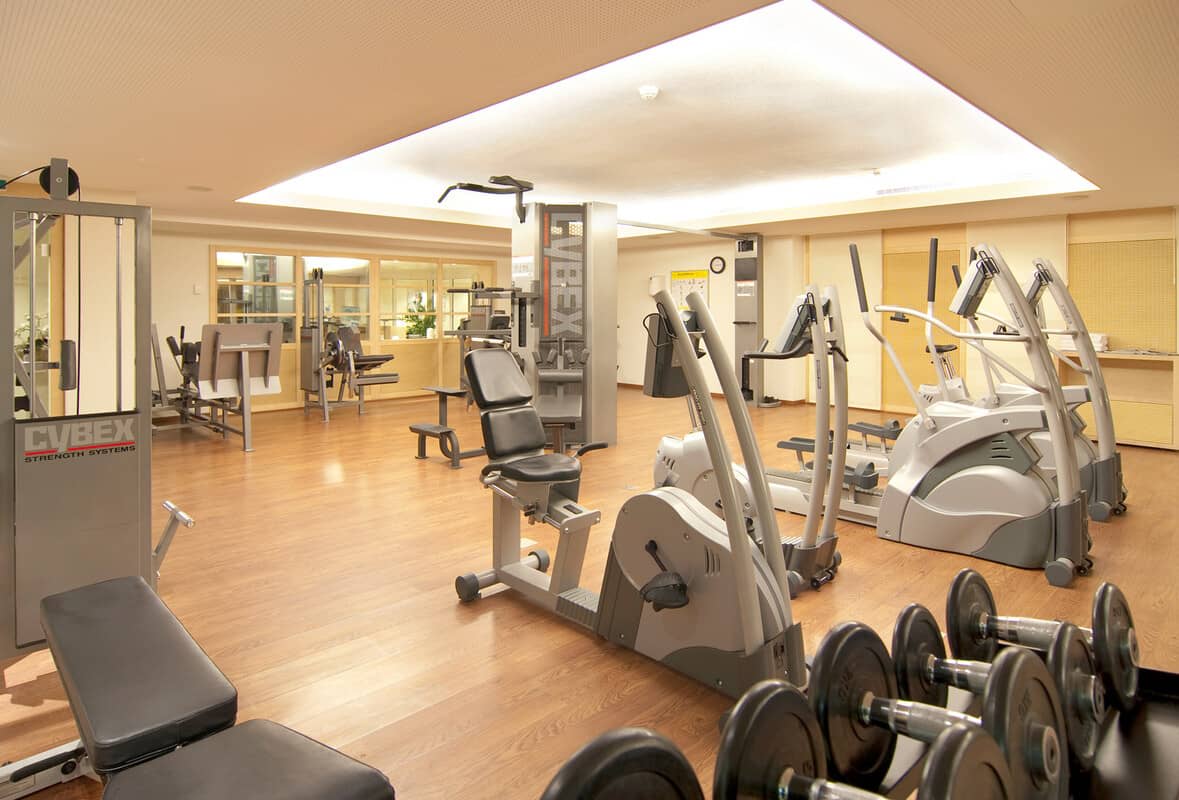 Fitness center with Cybex strength equipment, ellipticals, and free weights