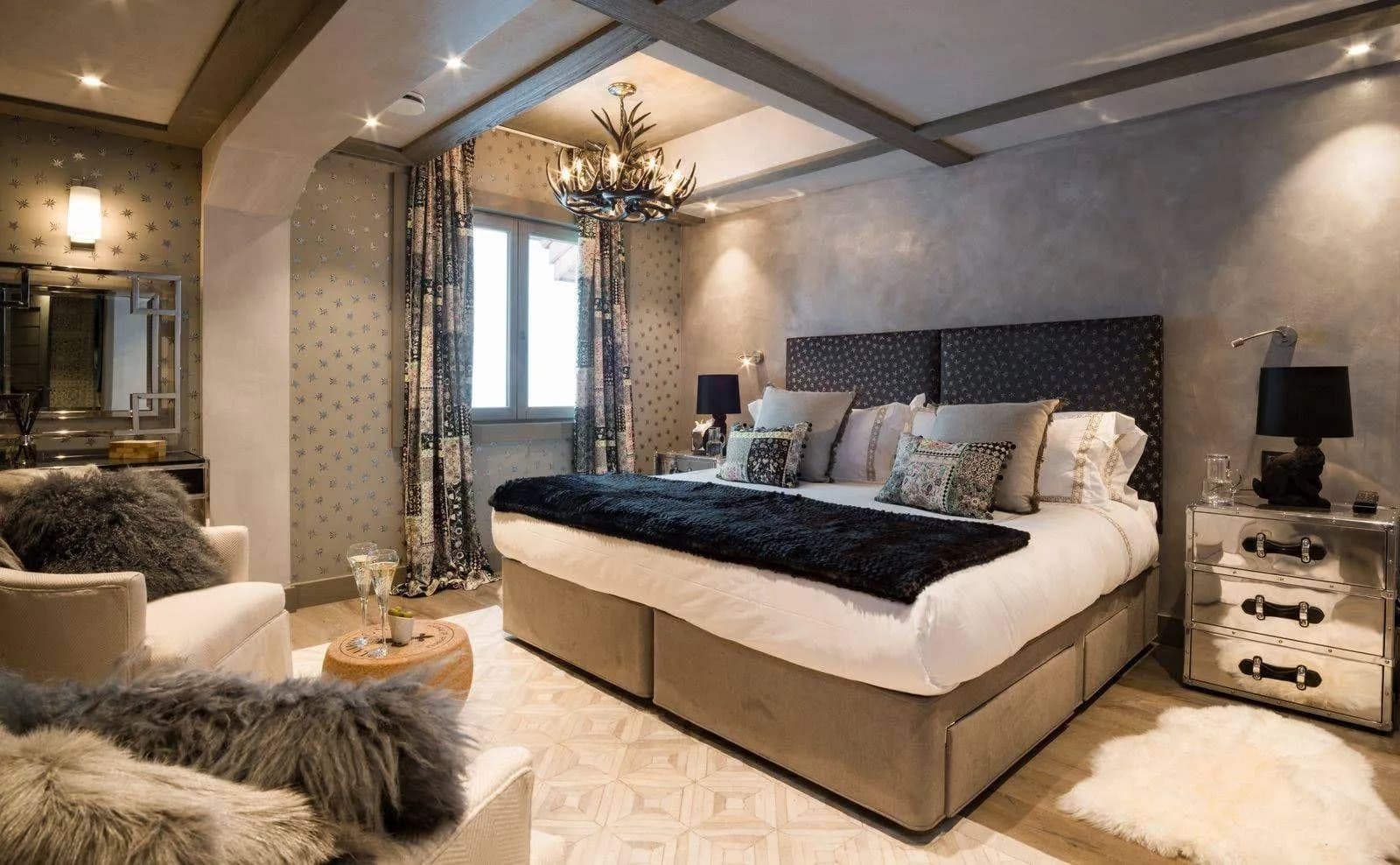 Double bedroom with a timber headboard and mirrored dressing table