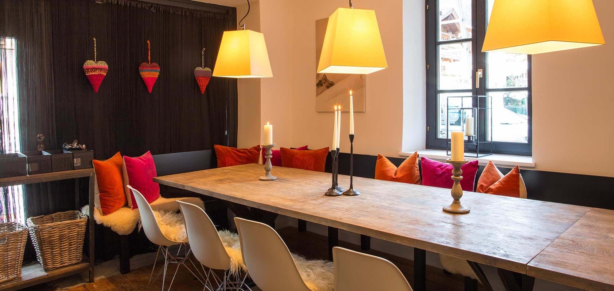 Dining area with banquet bench and seating for at least 10 guests